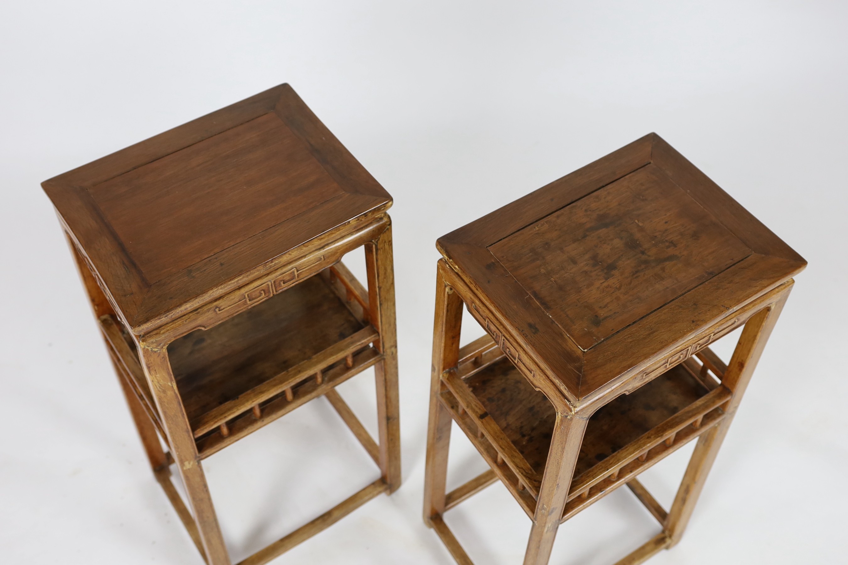 A pair of Chinese elm incense stands, 19th century, 39cm wide, 83.5cm high, 30cm deep